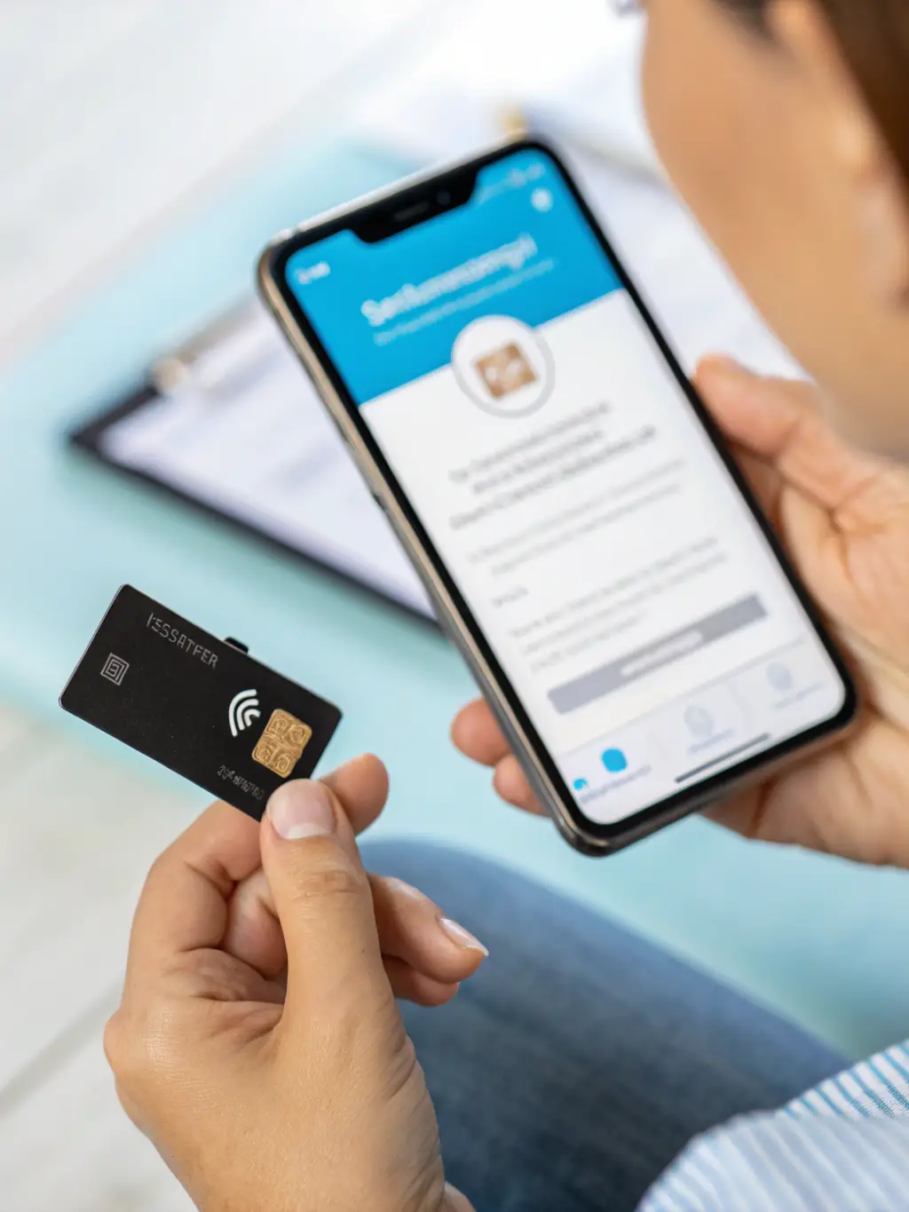 A person activating a SIM card at K Mobile 1, showing a seamless and quick activation process.